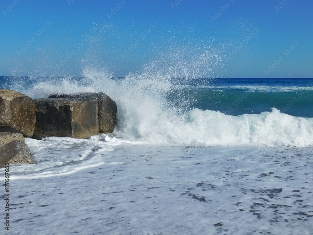 Waves on the sea rocks on a beach