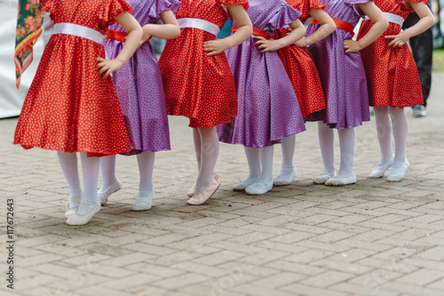 legs girls in color dresses
