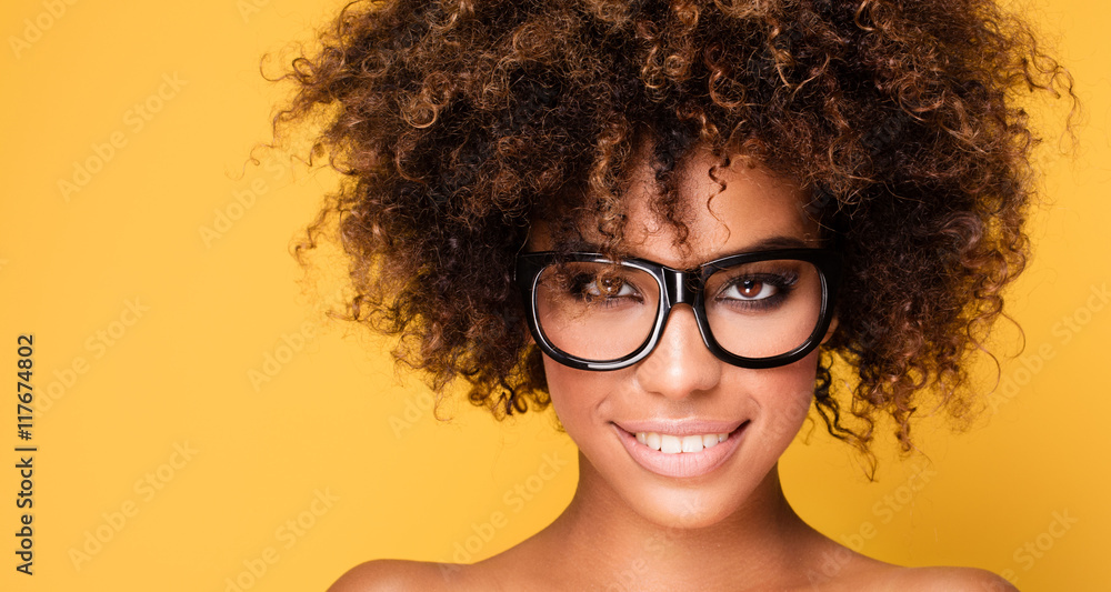 Portrait of young girl with afro. Portrait of young girl with afro.