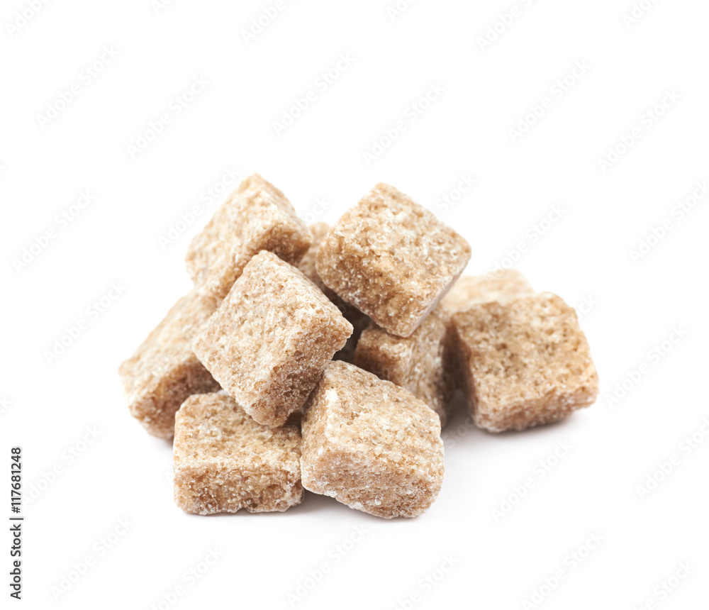 Pile of brown sugar cubes isolated Pile of brown sugar cubes isolated