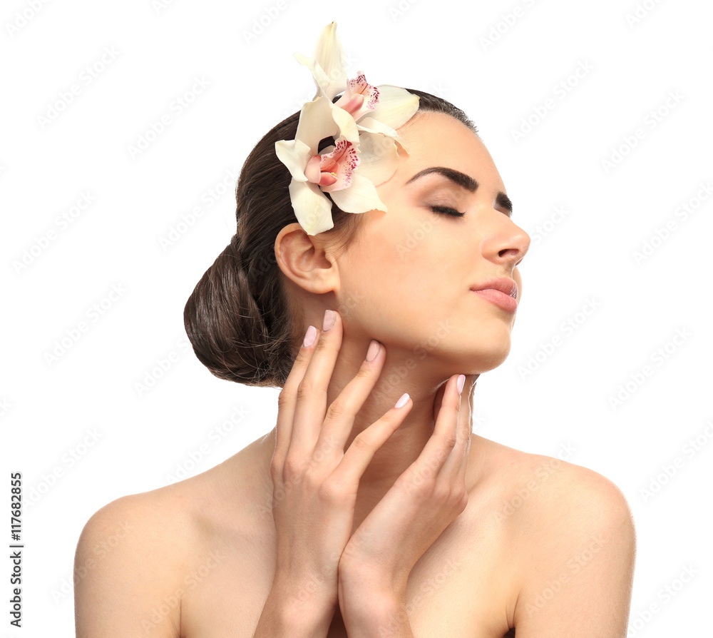 Pretty woman with orchid isolated on white Pretty woman with orchid isolated on white