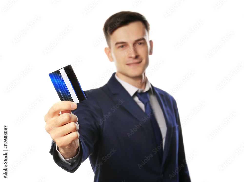 Handsome businessman with credit card, isolated on white Handsome businessman with credit card, isolated on white