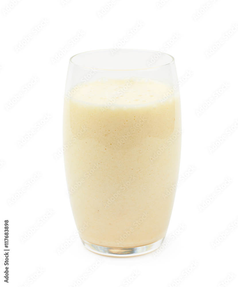 Glass filled with milkshake isolated Glass filled with milkshake isolated