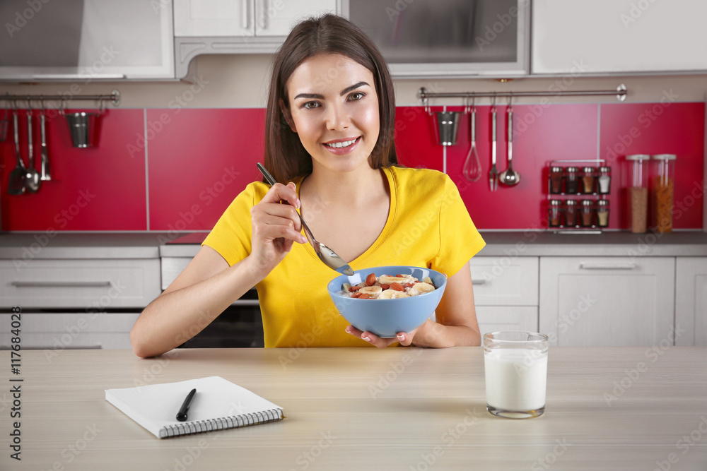 Healthy food concept. Woman having healthy breakfast Healthy food concept. Woman having healthy breakfast