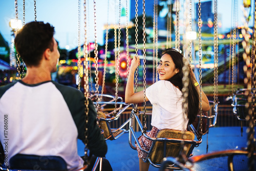 Couple Dating Amusement Park Enjoyment Hugging Concept photo