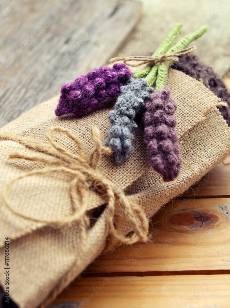 Fototapeta premium Handmade gift, knitted lavender flower