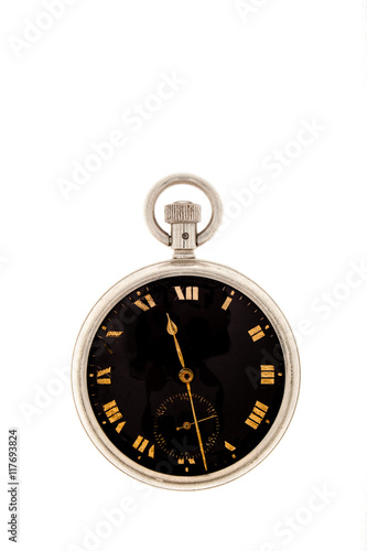 Vintage pocket watch with a black dial.