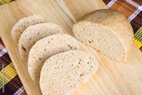 Delicious homemade steamed bread from whole wheat flour. Knodel, knedlik, knedle, dumpling is a traditional Central and Eastern European side dish  photo