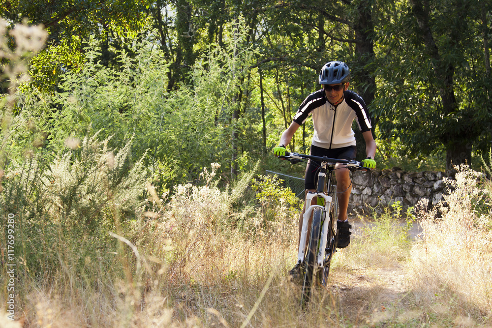 Naklejka premium cycling with mountain bike outdoor
