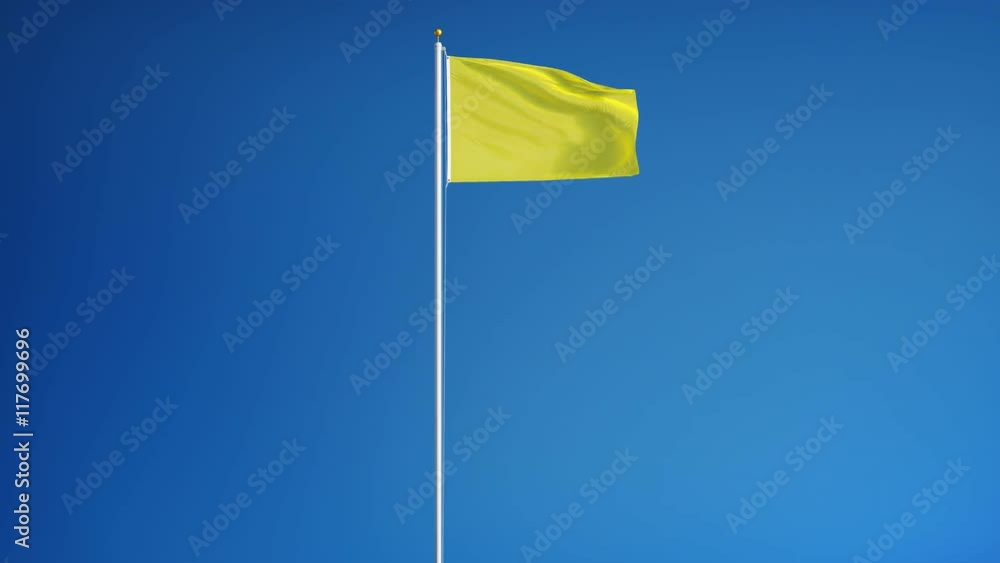Bright yellow flag waving in slow motion against blue sky, seamlessly looped, long shot, isolated on alpha channel with black and white luminance matte, perfect for film, news, digital composition Bright yellow flag waving in slow motion against blue sky, seamlessly looped, long shot, isolated on alpha channel with black and white luminance matte, perfect for film, news, digital composition