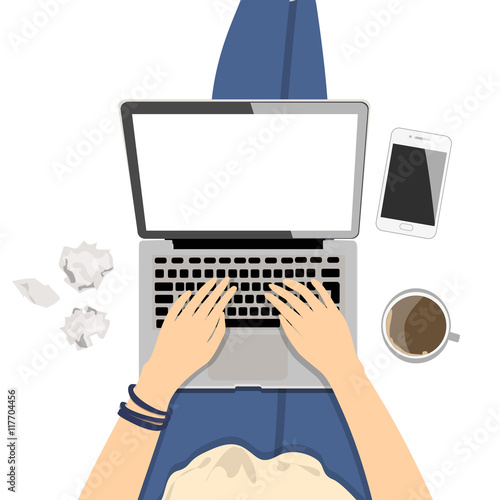 Girl with laptop. Seen from above, plan view. Concept of home office, surfing the Internet, writing and freelance.