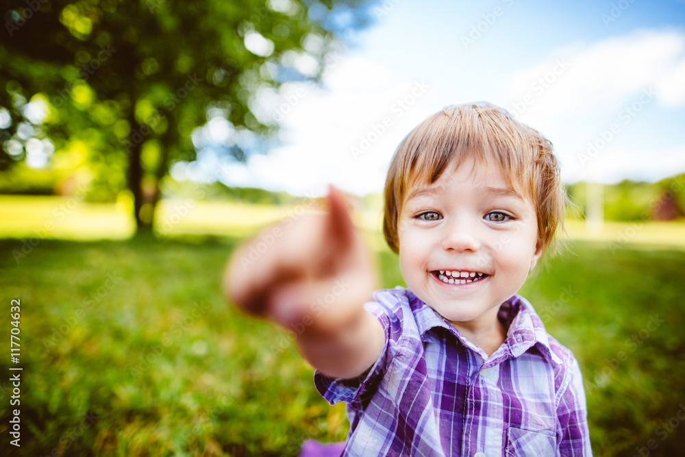 portrait of a little boy.portrait of a child in the park portrait of a little boy.portrait of a child in the park