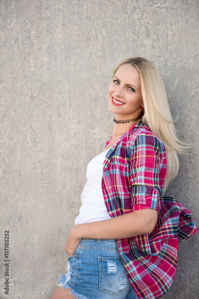 Portrait of a young girl blondes with red lipstick. Portrait of a young girl blondes with red lipstick.