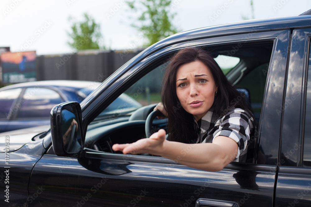 Angry woman in a car