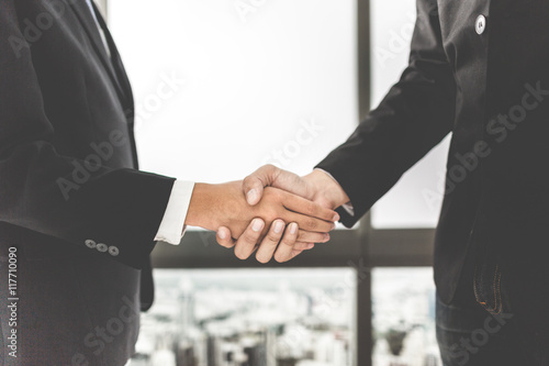 Business handshake and business people