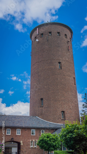 water tower with side building and gate