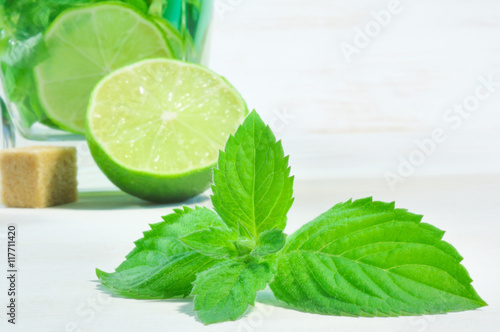 Green mint on wooden background