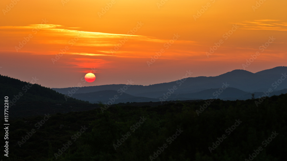 Sunset at greek coast in Sithonia, aerial photo from the top of a hill, Greece