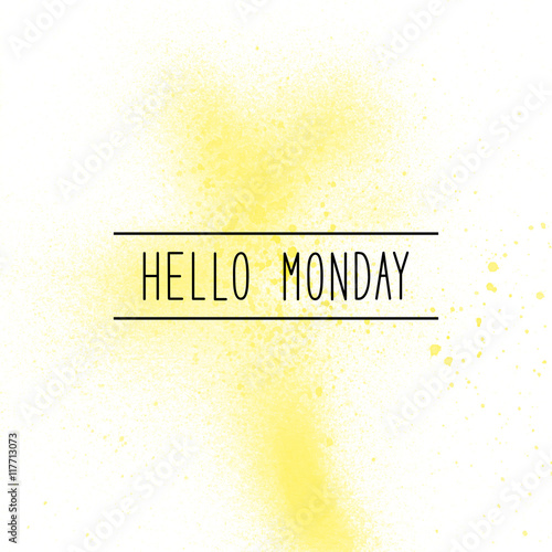 Hello Monday text on yellow spray paint background