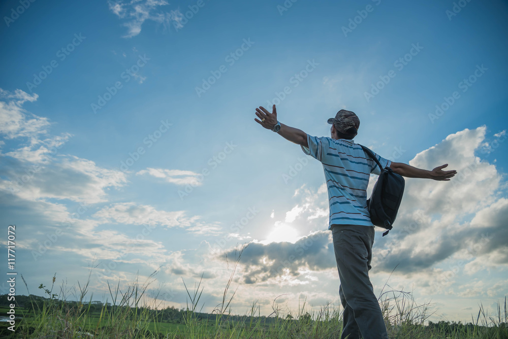 man travelling in nature with backpack man travelling in nature with backpack