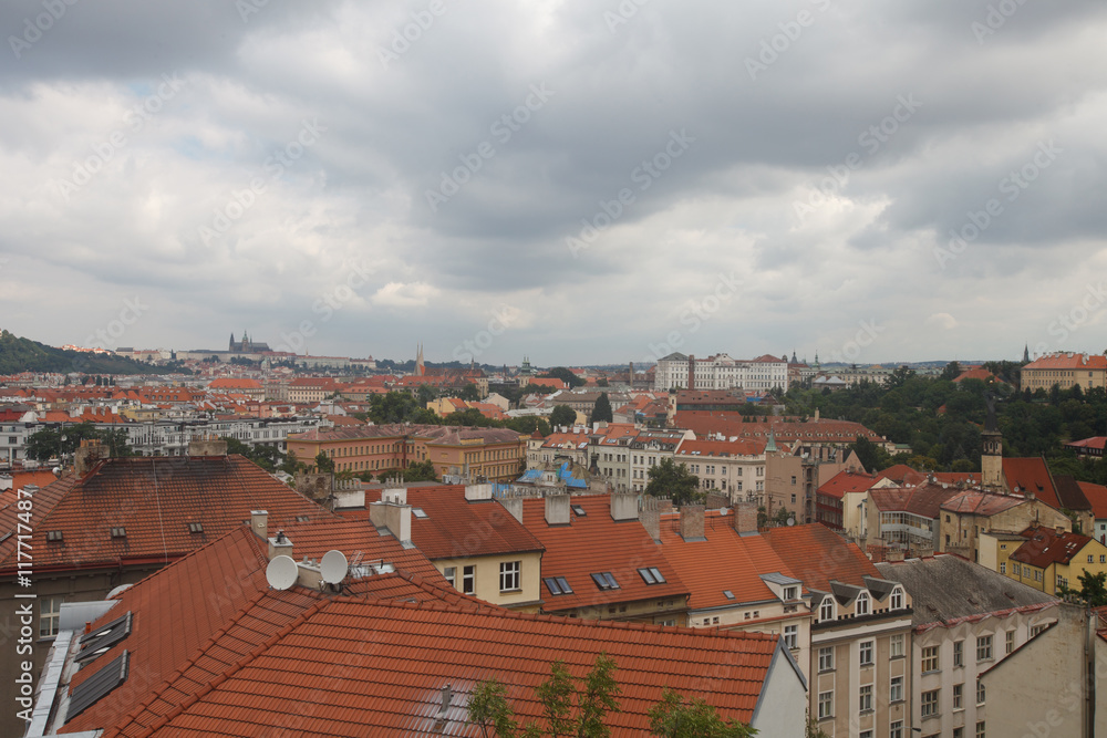 Traditional architecture of Prague. Aerial view of red roofs.