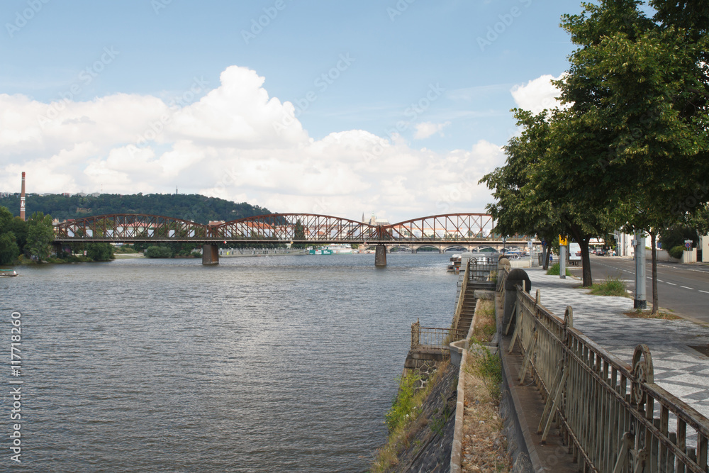 Embankment in Prague. View on the railway bridge