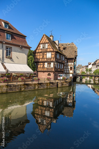 Strasbourg, France. The scenic landscape with reflection in the water of old buildings in the historic quarter, "Petite France"
