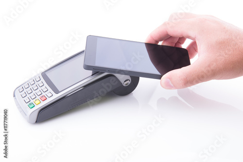 Hand with a smartphone on a POS
