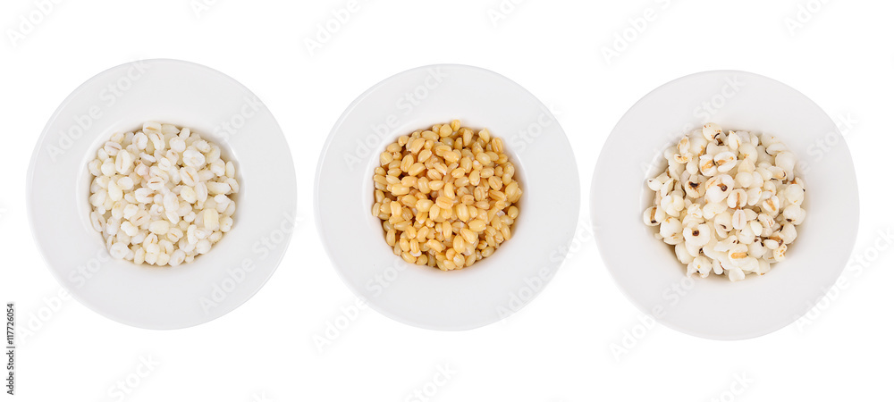 pile of pearl barley,white sorghum,Millet isolated on white pile of pearl barley,white sorghum,Millet isolated on white