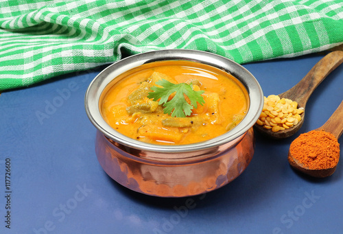 Indian curry, a traditional and popular food, made with vegetables, lentils and sambar powder. photo