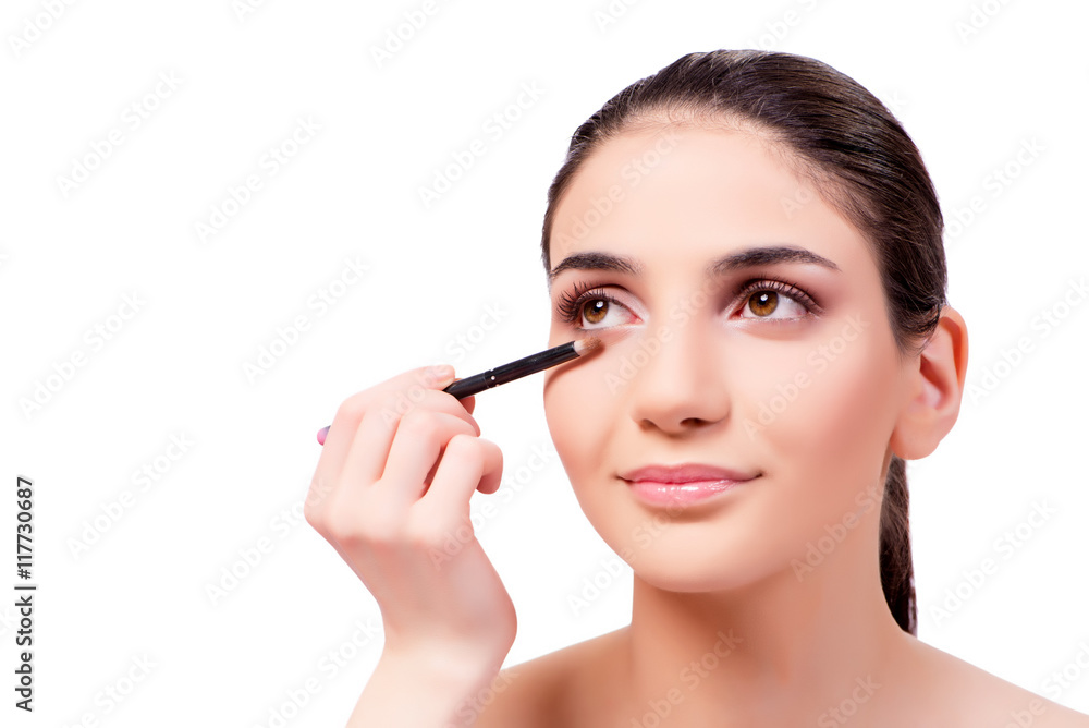 Beautiful woman during make-up cosmetics session