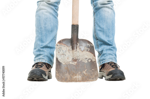 Construction worker in close-up holding shovel