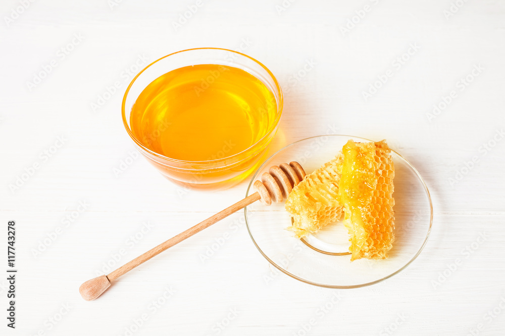 Honey with and wooden spoon Honey with and wooden spoon