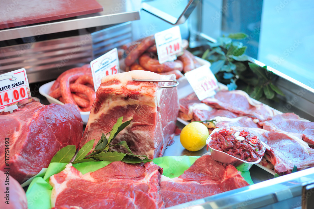 Raw meat on butcher table