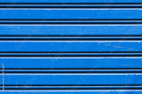 closeup of blue shutter door