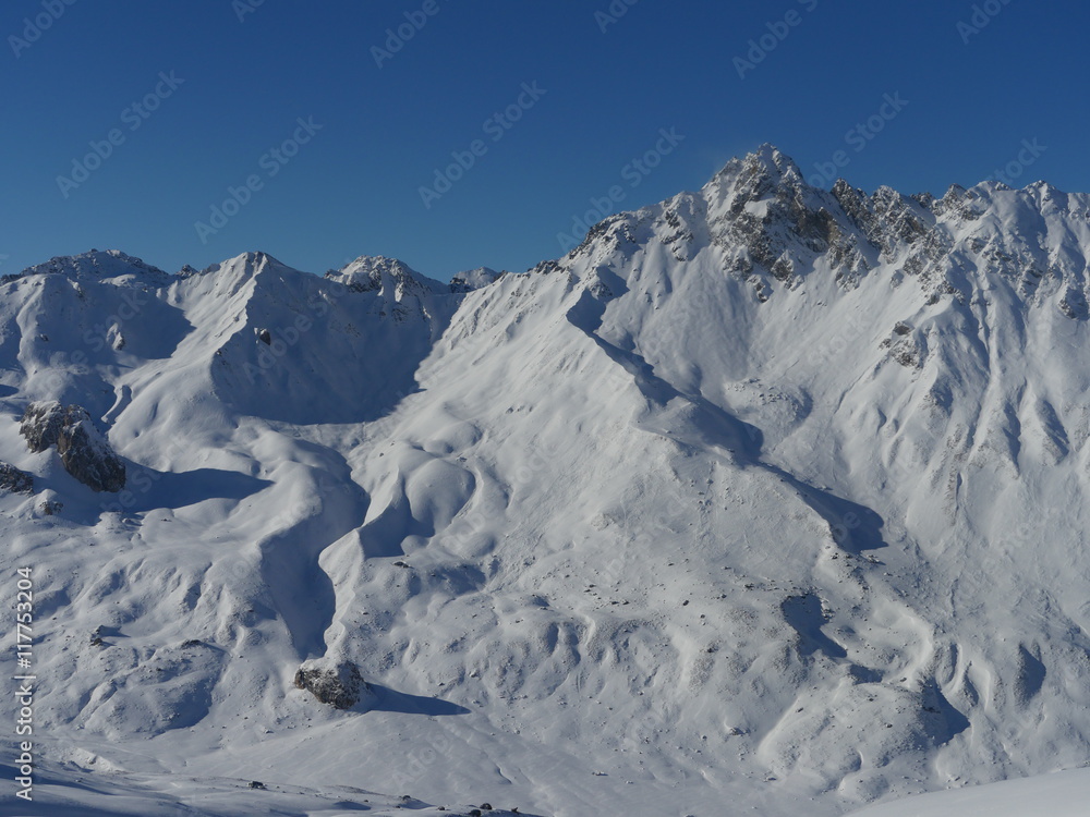 Winter snow covered mountain peaks in Europe. Great place for  sports