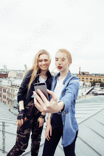 two blonde real teenage girl hanging out at summer together best friends, lifestyle people concept