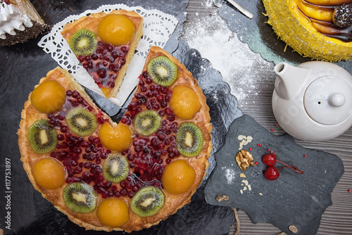 Table with fruit cakes