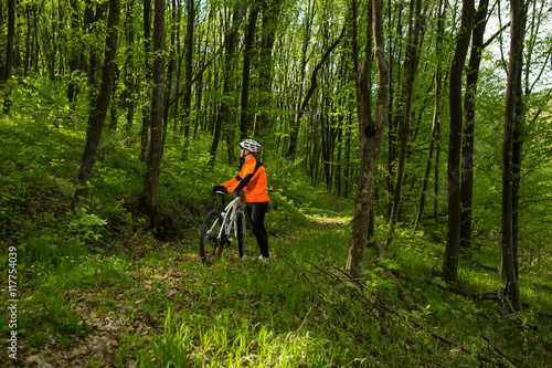 Biker on the forest road