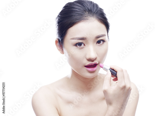 young asian woman with lipstick  isolated on white background