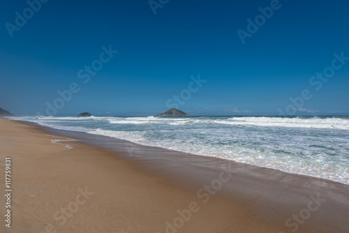 Empty tropical Grumari beach near Rio de Janeiro city