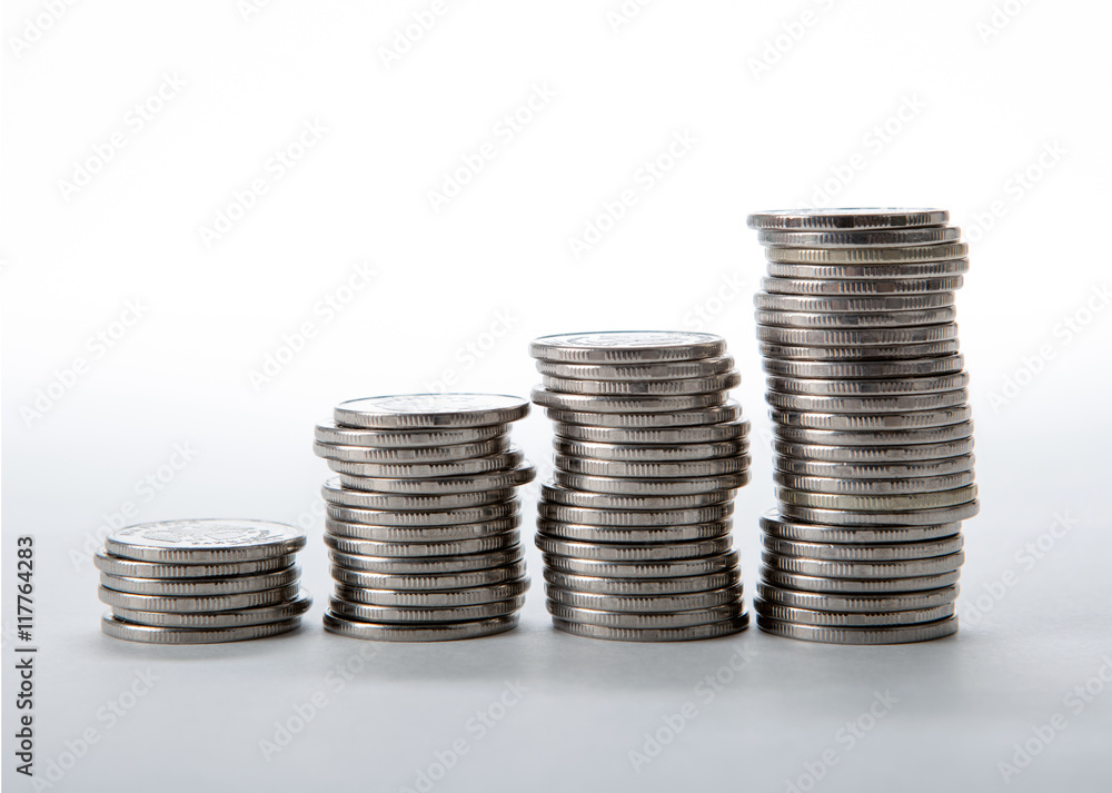 stacks of coins on a white background stacks of coins on a white background