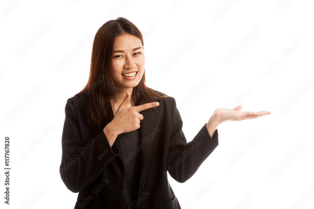 Beautiful young Asian woman point to palm hand. Beautiful young Asian woman point to palm hand.