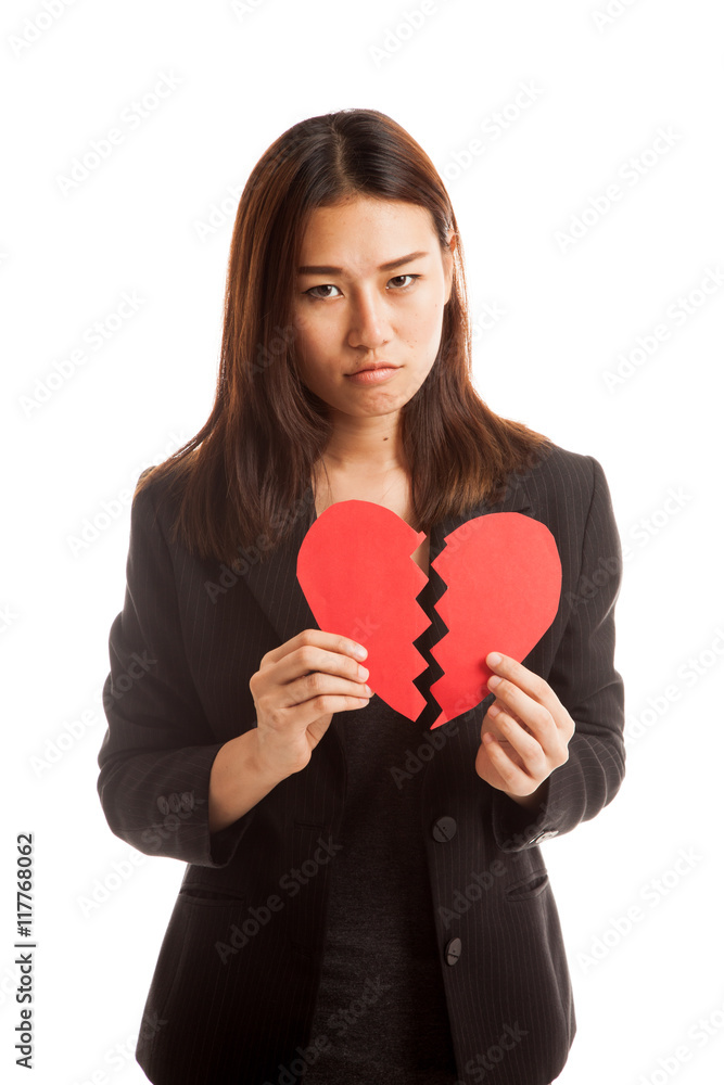 Beautiful young Asian woman with broken heart. Beautiful young Asian woman with broken heart.