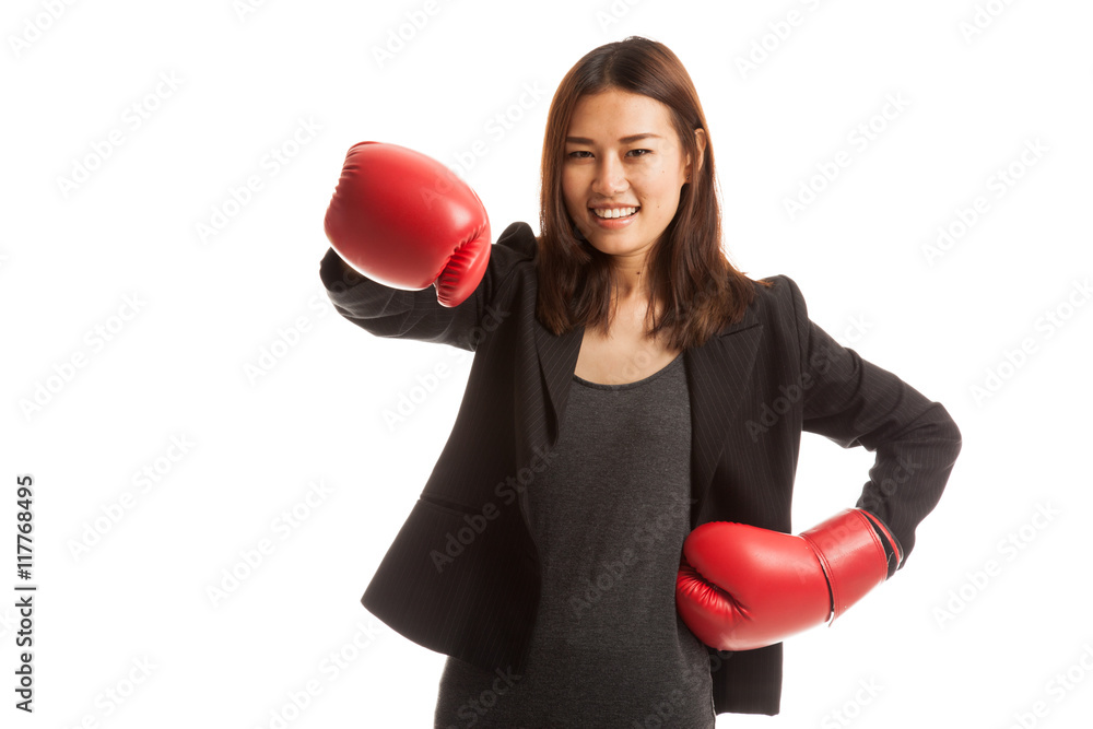 Young Asian business woman with red boxing gloves. Young Asian business woman with red boxing gloves.