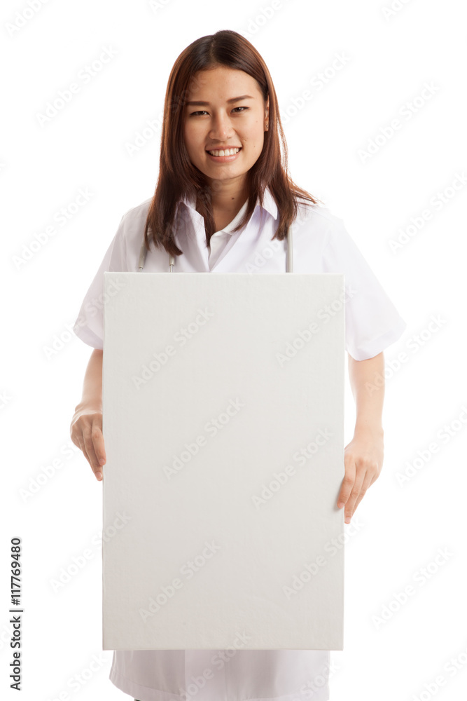 Young Asian female doctor show a blank sign. Young Asian female doctor show a blank sign.