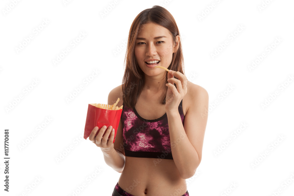 Beautiful Asian healthy girl eat french fries. Beautiful Asian healthy girl eat french fries.