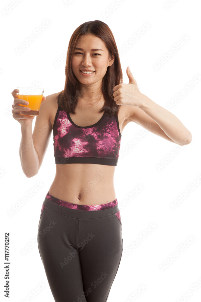 Beautiful Asian healthy girl drinking orange juice thumbs up. Beautiful Asian healthy girl drinking orange juice thumbs up.