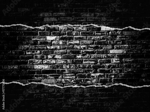 old black vintage brick wall texture background with darker vign photo