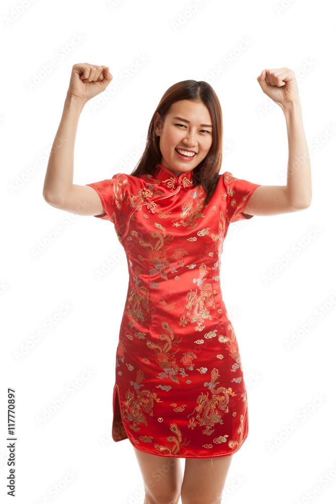 Happy Asian girl in chinese cheongsam dress. Happy Asian girl in chinese cheongsam dress.